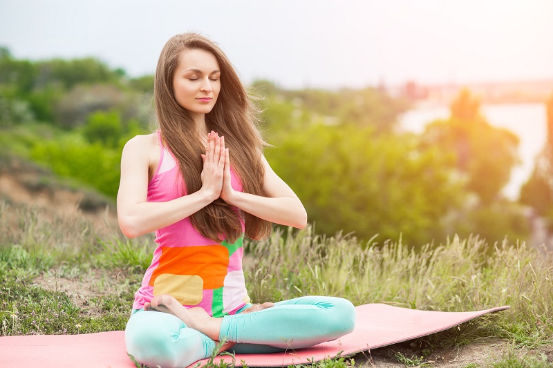 young woman meditating